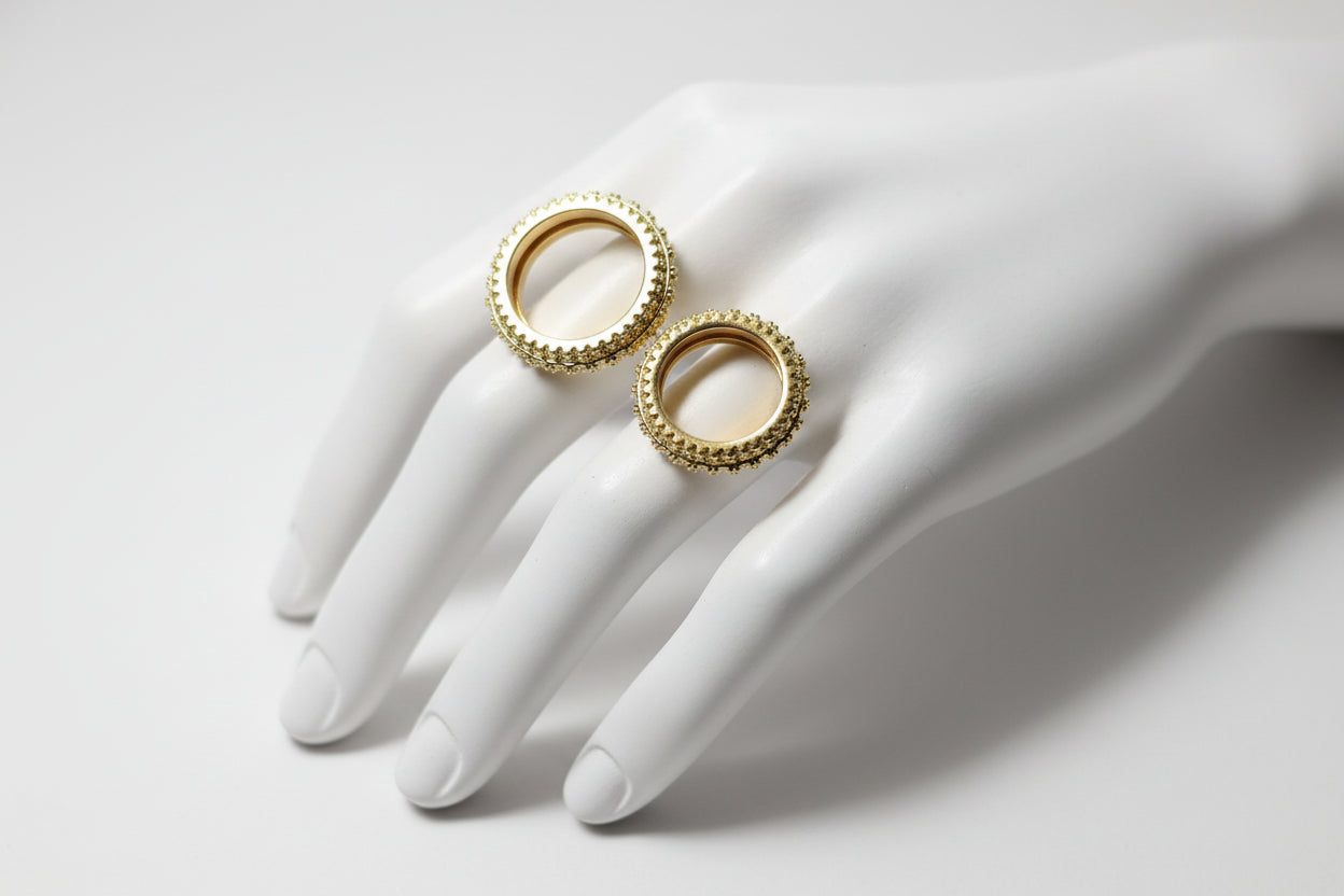 18k Gold-Tone iced out ring.