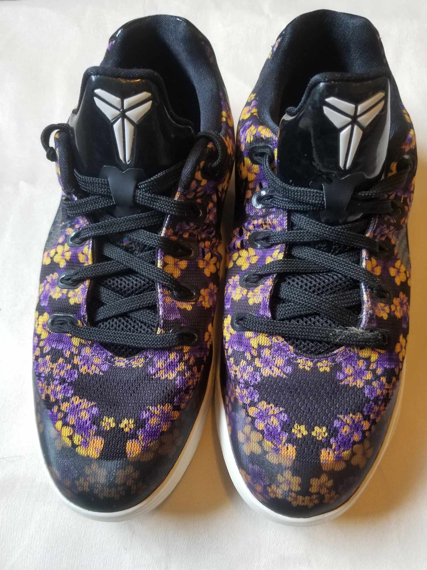 Nike Kobe Bryant "9 em floral" size 5.5y Big Kids/Women. Color black,yellow, and purple. PRE-OWNED