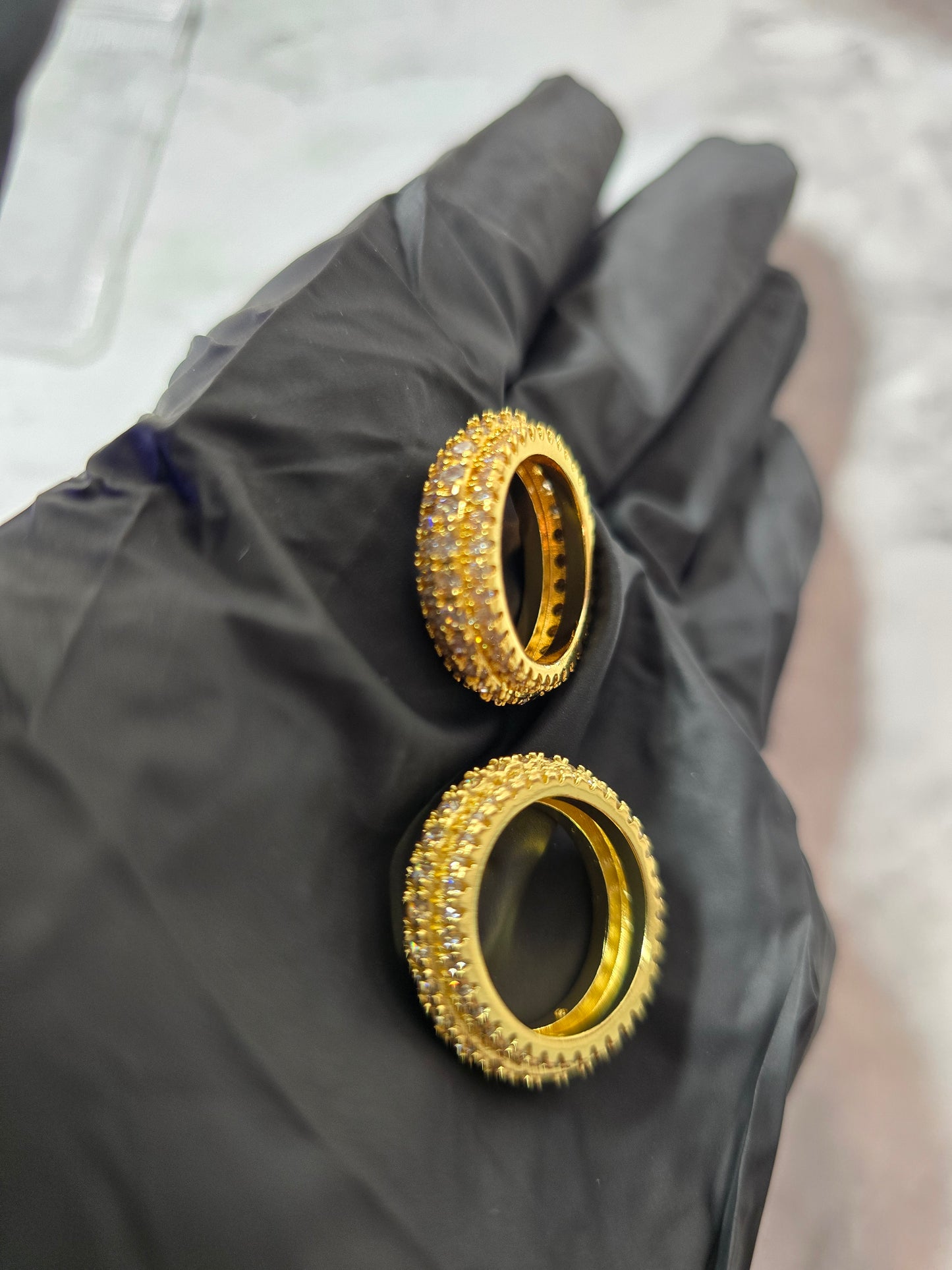 18k Gold-Tone iced out ring.