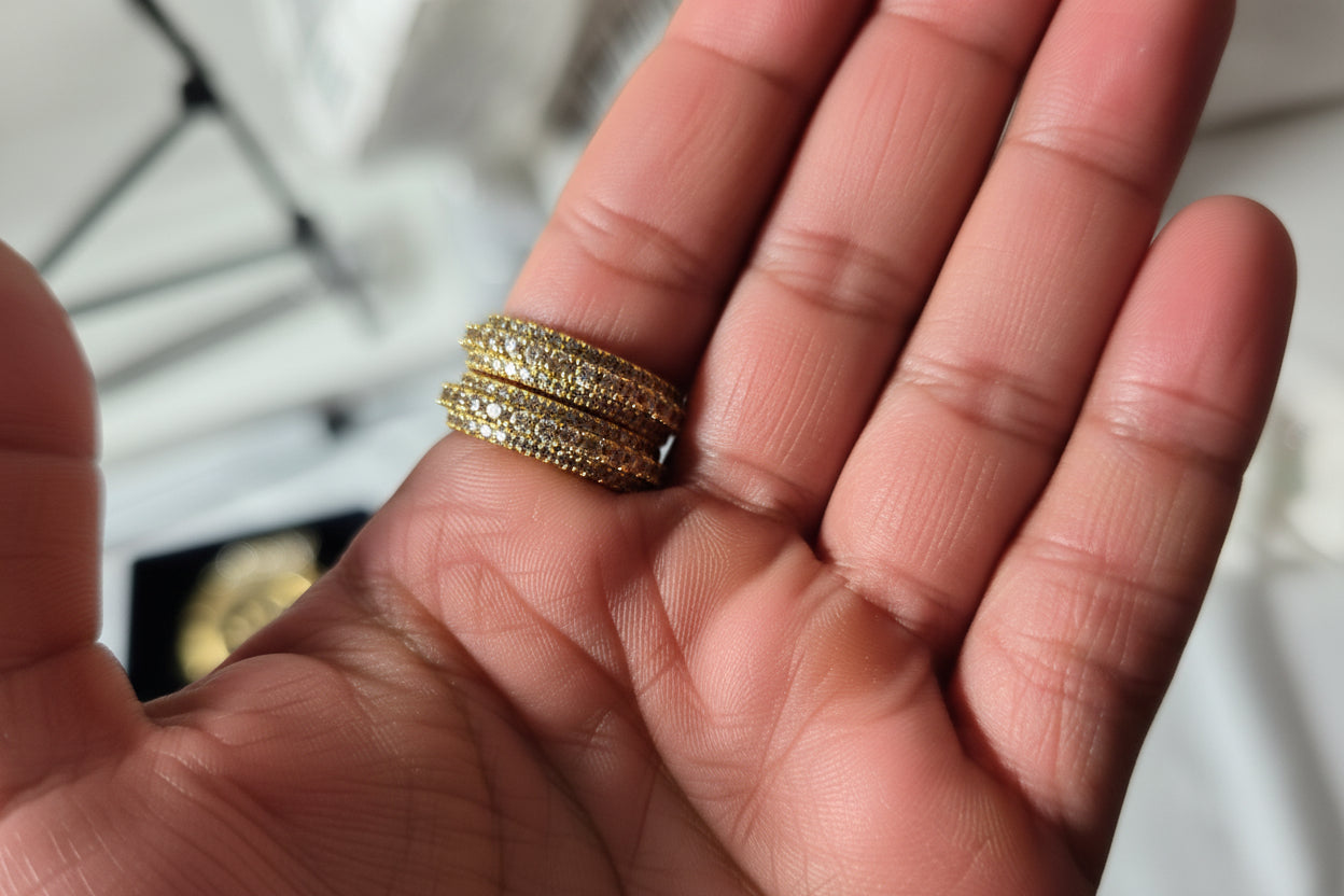 18k Gold-Tone iced out ring.